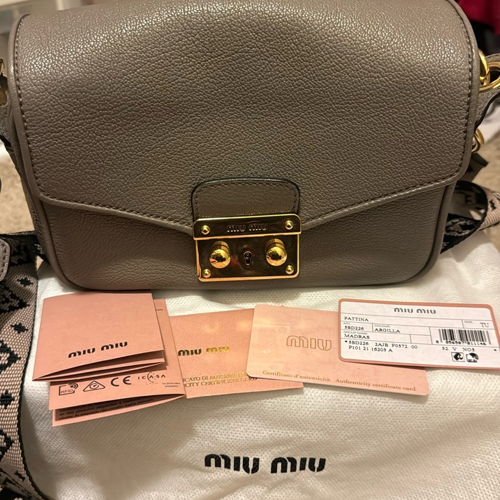 Original,Pre Owned, Like New Miu Miu Madras. - image 1